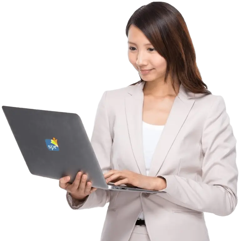 Business professional working on laptop with SPR logo, representing Search Party Recruiting solutions