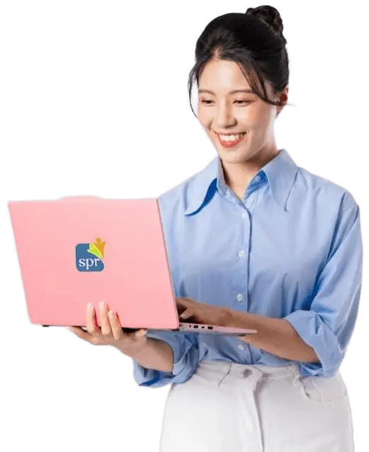 Smiling professional woman using a pink laptop with the Search Party Recruiting logo, representing virtual staffing services