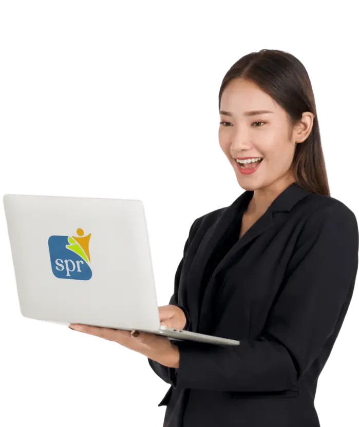 Smiling professional using laptop with SPR logo, representing Search Party Recruiting&rsquo;s remote staffing services