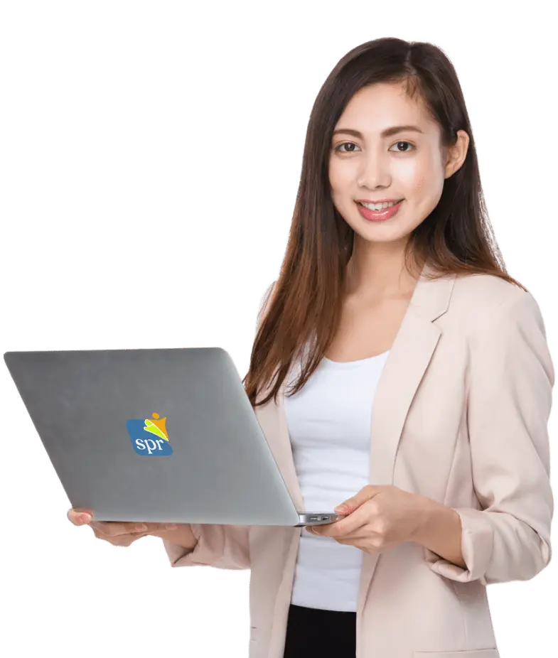 Business professional working on laptop with SPR logo for Search Party Recruiting&rsquo;s recruitment services