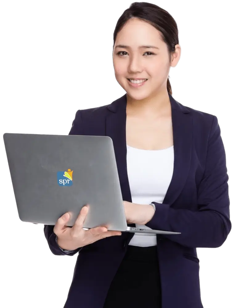 Professional woman working on SPR laptop, aligned with Search Party Recruiting&rsquo;s remote operations and administrative support