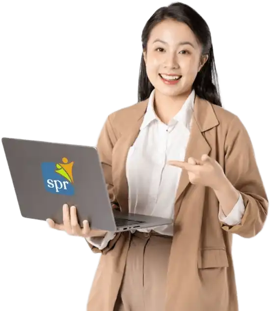 Smiling professional woman pointing at a laptop with the Search Party Recruiting logo, representing remote staffing services