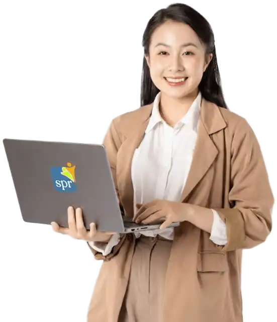 Smiling recruiter using SPR-branded laptop for Search Party Recruiting&rsquo;s remote staffing services